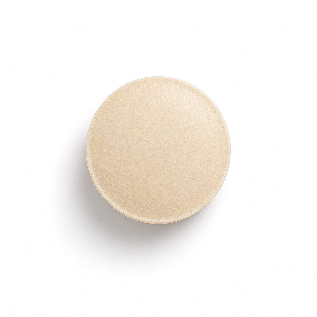 A round, light beige , Cordyceps Sinensis tablet supplement shown from a top-down perspective on a clean white background.