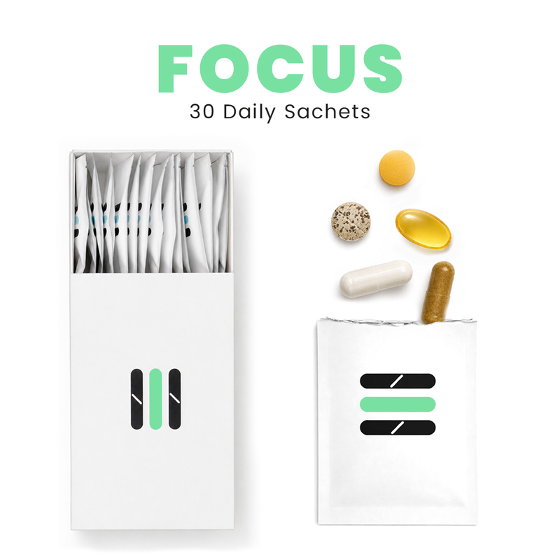 Packaging of 'FOCUS' 30 Daily Sachets with various pills and a white box on a white background.