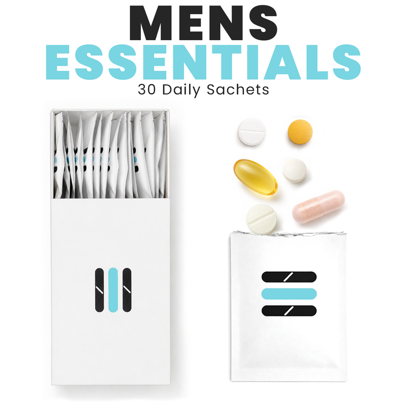 Packaging of 'Mens Essentials' with daily sachets and colorful pills on a white background
