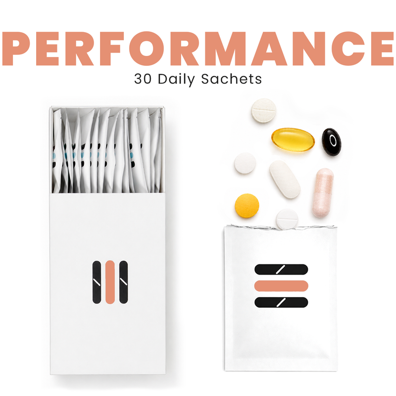 Supplement packaging with pills and a box labeled 'Performance' on a white background