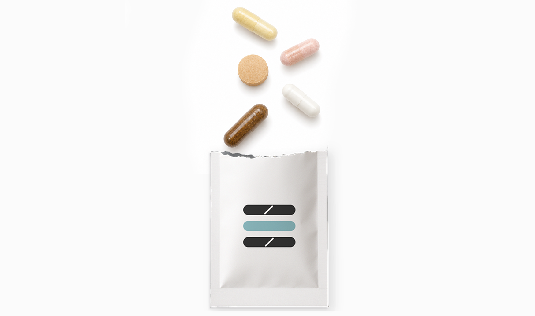 White packaging with colorful pills on a white background